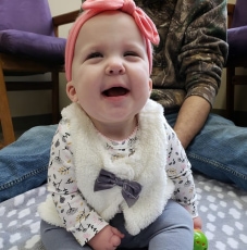 Image of smiling baby girl