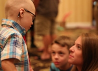 Image of girl talking to boy with WAGR syndrome