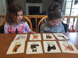 Image of children with word flashcards