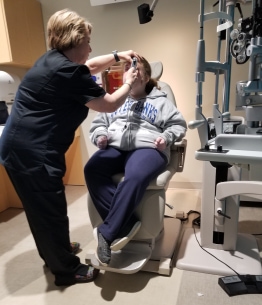Young adult undergoing eye exam