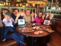 Image of family around the table for rare disease day